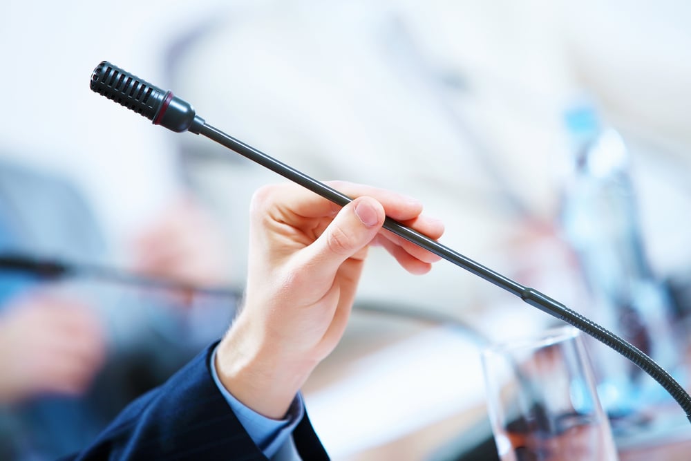 before a conference, the microphones in front of empty chairs.-1 before a conference, the microphones in front of empty chairs.-1