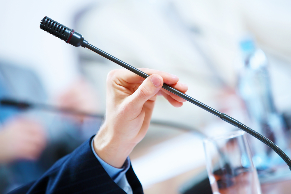 before a conference, the microphones in front of empty chairs. before a conference, the microphones in front of empty chairs.